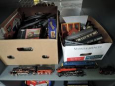 A shelf of 00 gauge including a Marklin Western Germany 4-6-2 three rail Loco & Tender in a Wrenn