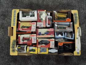 A box containing over 30 boxed 00 scale Cars, Lorries and Buses, most boxed