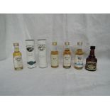Seven Miniature bottles of Bowmore Islay Single Malt Whisky, 10 year old 43% vol in tube, Legend 40%