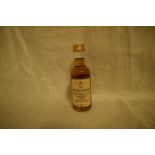 A Macallan Single Highland Malt Scotch Whisky Miniature, 1973 bottled 1991, 43% 5cl