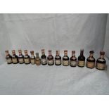 Fifteen Drambuie Miniatures mainly different ages and bottlings, Cork Top White and Red label on