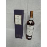 A bottle of Single Malt Whisky, The Macallan 18 Year Old Exclusively Matured in Selected Sherry