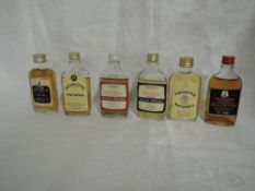 Six Single Malt Whisky Miniatures all in glass flask bottles, Mortlach no age 100 proof no capacity,