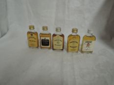 Five Single Malt Whisky Miniatures in glass flask bottles, Longmorn-Glenlivet 12 year old 70 proof
