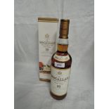 A bottle of Single Malt Whisky, The Macallan 10 Year Old Matured in Selected Sherry Oak Cask from