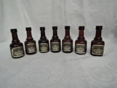 Seven Miniature bottles of Bowmore Islay Single Malt Whisky, Aged 12 year old 40% vol, Aged 12