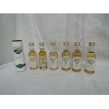 Seven Miniature bottles of Bowmore Islay Single Malt Whisky, Maund's 10 year old Guinness Book of