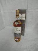 A bottle of Single Malt Whisky, The Macallan 10 Year Old Fine Oak Triple Cask Matured 40% vol