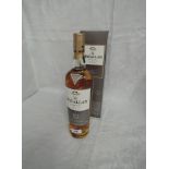 A bottle of Single Malt Whisky, The Macallan 10 Year Old Fine Oak Triple Cask Matured 40% vol