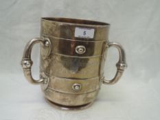 A large Victorian silver three handled trophy inscribed Carnforth Auction Mart Challenge Cup