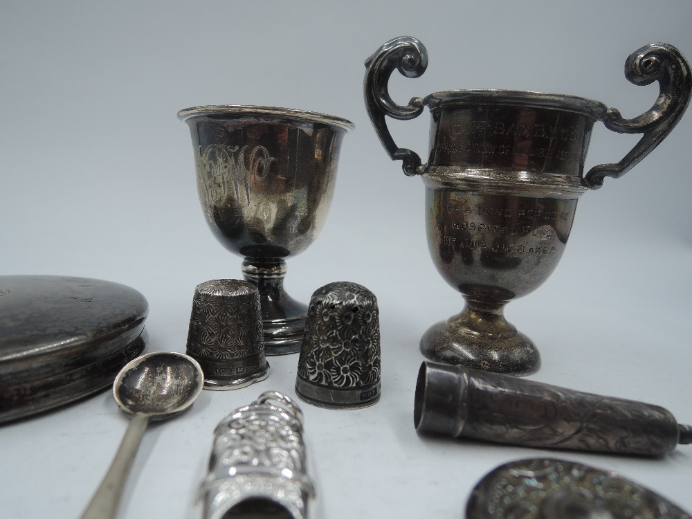 A small selection of HM silver and white metal including egg cup, trinket lid, miniature trophy cup, - Image 2 of 2