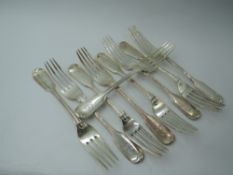 Nine Victorian silver dessert forks in the fiddle and thread pattern, bearing Boar's head crest to