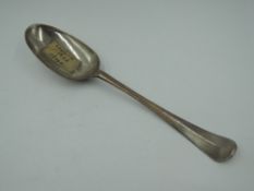 A Georgian silver rat tail spoon bearing monogram to reverse of terminal and having bottom marked