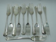 Eleven Victorian silver dessert forks of plain form bearing monogram to terminals, Exeter 1873,