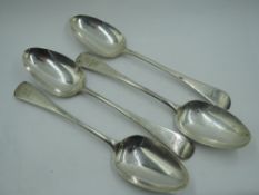 Four Georgian silver table spoons of Old English form bearing bull's head crest to terminals, London