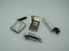 Four pieces of HM silver including a stamp box, vesta and two cigarette tip holders, approx 77g