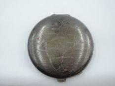 A white metal powder compact stamped silver having Indian map engraved to front with seven inset