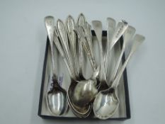 Six Georgian silver egg spoons of fiddle back form bearing monograms to terminals, London 1829,