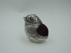 An Edwardian silver chick pin cushion RD no 475678 having plush maroon velvet cushion, Chester