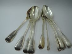 Nine Victorian silver table spoons in the fiddle and thread pattern bearing Boar's head crest to
