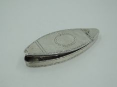 A Georgian silver snuff box of lozenge form having bright cut decoration to hinged lid and sides,