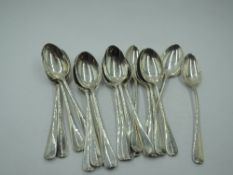 Eighteen modern HM silver coffee spoons of rat tail form, most being Sheffield 1925/26/27/31, Cooper