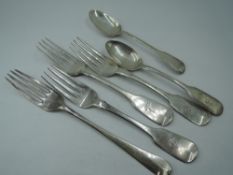 Three Irish Georgian silver dessert forks of fiddle back pattern bearing crest to terminals,