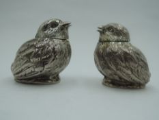 A pair of Edwardian silver pepperettes in the form of chicks, London 1908, Sampson & Mordan & Co,
