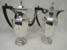 A silver coffee pot and matching hot water jug, each having tapering octagonal bodies to pedestal