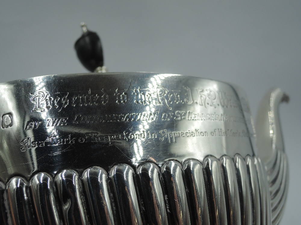 A Victorian silver teapot of oval form having gadrooned decoration to body with inscription to - Image 3 of 3