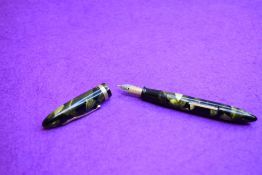 A Sheaffer Lifetime Junior leverfill fountain pen in green preal and black with single band to cap