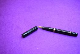 A Mabie Todd & Co Blackbird Self filler Leverfill fountain pen, in BHR with band to top and bottom