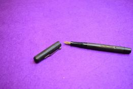 A Mabie Todd & co Swan Self Filler leverfill fountain pen in BHR (discoloured), screw cap, with Swan