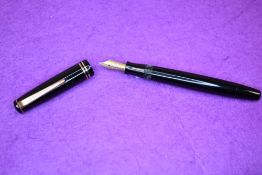 A Parker Victory button fill fountain pen in black with two narrow bands to the cap having a