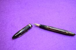 A Sheaffer Balanced Lifetime 1000 Vac-fil fountain pen in brown striated having Sheaffer Lifetime