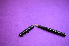 A Mabie Todd & Co Swan L212/60 Leverless twist filler, in black with two bands to cap and a Swan No2