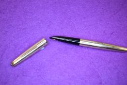A Parker 61 in rolled gold with engine turned decal (engraved W.M). Approx 13.6cm