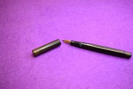 A Mabie Todd & Co Self Filler leverfill fountain pen in BHR (turned brown), with a Swan 2 14ct