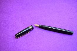 A Mabie Todd & Co Swan Leverless twist filler, in black with two narrow and one broad band to cap