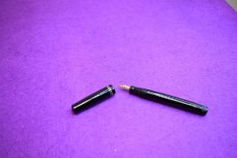 A Mabie Todd & Co Swan L112/60 Leverless twist filler, in black with two bands to clipless cap and a