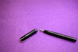 An R Esterbrook lever fill fountain pen in black with single narrow band to cap having Esterbrook