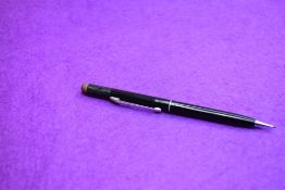 A Sheaffer propelling pencil in black