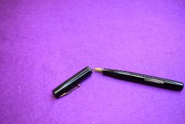 A Watermans Ideal 32A leverfill fountain pen in black with a single narrow band to the cap and a
