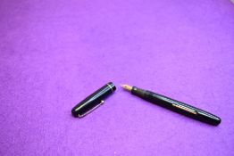 A Mabie Todd & Co Swan 3160 Self filler leverfill in black, single band to cap, with Swan No1 nib.