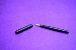 A Mabie Todd Swan Safety Pen eyedropper fountain pen in black having a Mabie Todd nib. Approx 11.