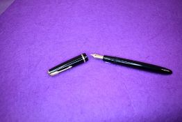 A Parker Senior Duofold fountain pen in black with a single narrow decorated band to the cap