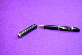 A Mabie Todd & Co SF130 leverfill fountain pen in BHR (turned brown)with gold bands to top and