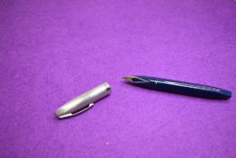 A Sheaffer Snorkel fountain pen in blue with brushed steel cap having Sheaffer nib. Approx 14.1cm