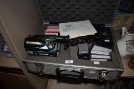 A cased Sanyo VM - EX25P video camera with accessories