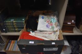 A selection of haberdashery including velvet waist coat and blankets